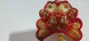 Three small lanterns are hung with printed double fish details Picture